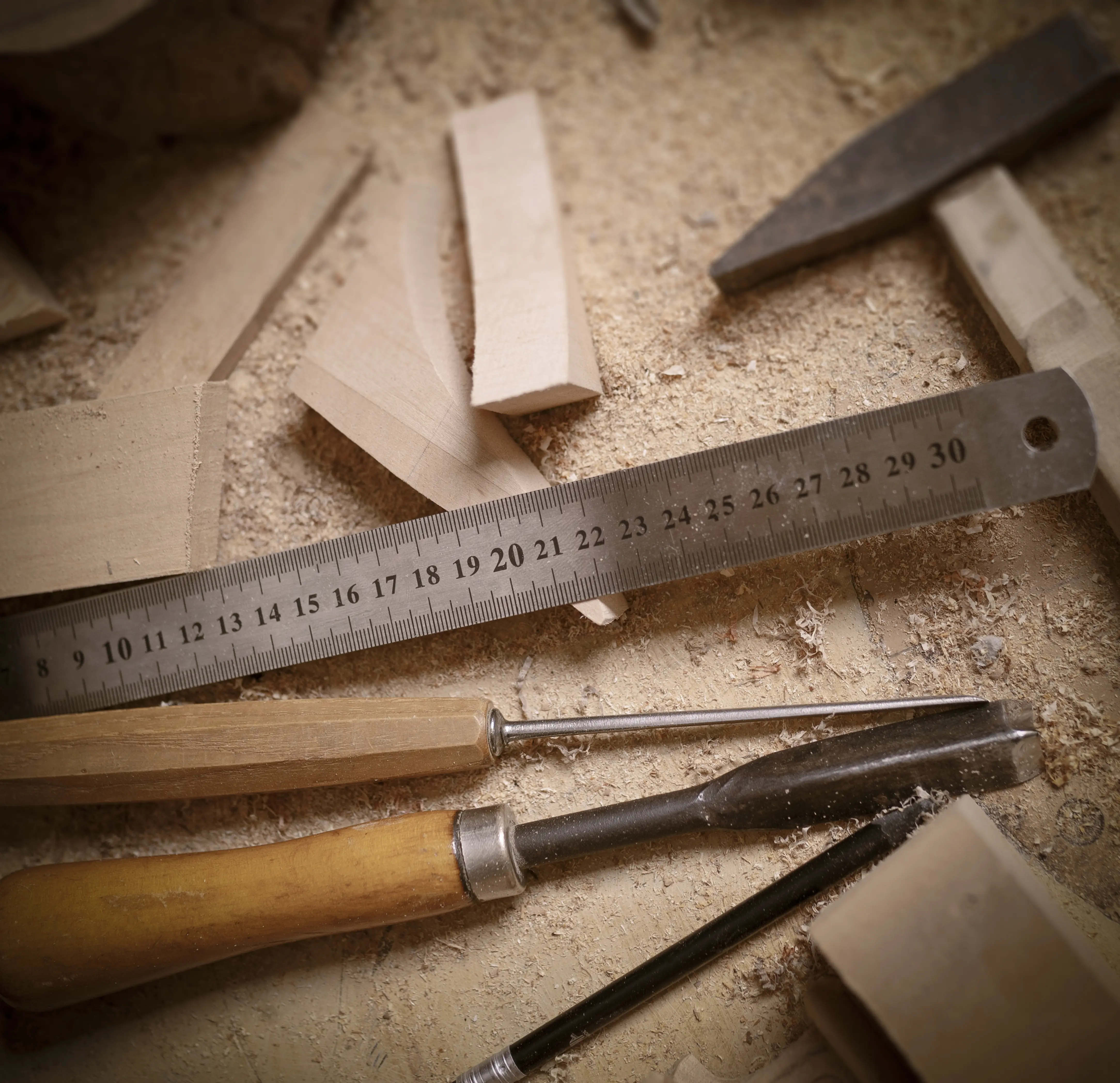 Workshop tools — rulers, chisels, wood offcuts